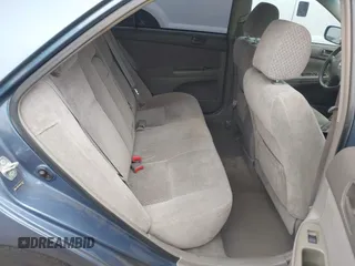 2004 Toyota Camry LE with VIN 4T1BF32K54U572537, listed as a IAAI auction lot 41850322 with 167,076 mi miles and . Bid and sale history available at DreamBid. Image 8.