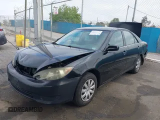 2006 Toyota Camry STD with VIN 4T1BE32K16U165708, listed as a IAAI auction lot 42138137 with 156,438 mi miles and . Bid and sale history available at DreamBid. Image 2.