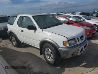 2001 Isuzu Rodeo z VIN 4S2CK57W614340766, wystawiony jako Copart lot #73891524 z przebiegiem 124 446 mil mil oraz Nie do naprawy. Historia ofert i sprzedaży dostępna na DreamBid. Obrazek 4.