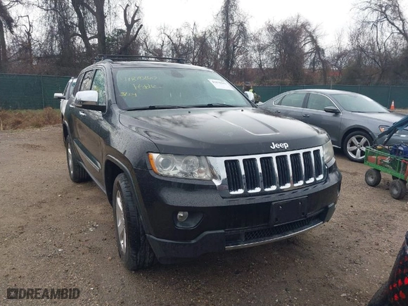 2013 Jeep Grand Cherokee Limited with VIN 1C4RJFBG0DC656382, listed as a IAAI auction lot 41870162 with 162,869 mi miles. Bid and sale history available at carsss.com. Image 12.