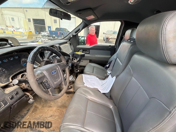 2014 Ford F-150 XL with VIN 1FTMF1CM3EKF29880, listed as a IAAI auction lot 42403946 with 137,607 mi miles and . Bid and sale history available at DreamBid. Image 1.