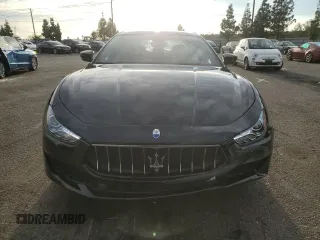 2021 Maserati Ghibli with VIN ZAM57XSA5M1369156, listed as a Copart auction lot 82876193 with 19,415 mi miles. Bid and sale history available at carsss.com. Image 5.