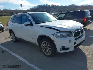 2016 BMW X5 xDrive35i with VIN 5UXKR0C52G0P29633, listed as a IAAI auction lot 41057391 with 176,697 mi miles. Bid and sale history available at carsss.com. Image 1.