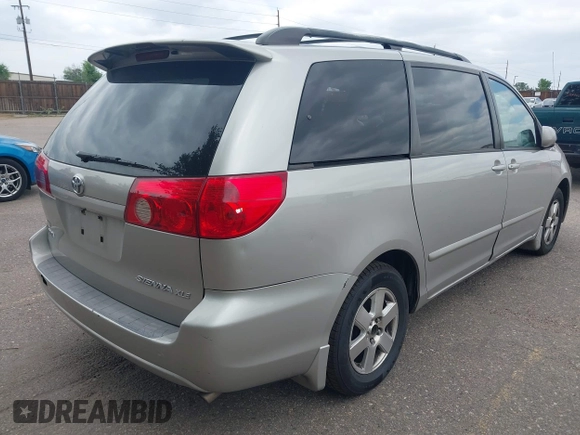 2008 Toyota Sienna XLE with VIN 5TDZK22C28S100727, listed as a IAAI auction lot 42570297 with 184,422 mi miles and . Bid and sale history available at DreamBid. Image 4.