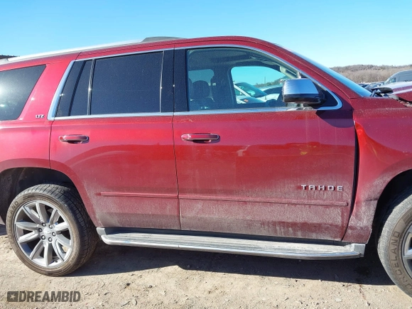 2016 Chevrolet Tahoe LTZ with VIN 1GNSKCKC9GR205745, listed as a IAAI auction lot 41710241 with 94,931 mi miles. Bid and sale history available at carsss.com. Image 13.