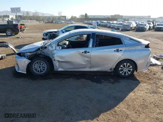 2021 Toyota Prius Prime LE with VIN JTDKAMFP1M3178179, listed as a IAAI auction lot 41233411 with 83,035 mi miles. Bid and sale history available at carsss.com. Image 15.