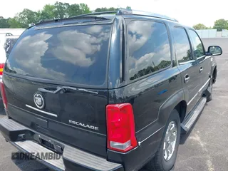 2003 Cadillac Escalade z VIN 1GYEC63T73R187253, wystawiony jako IAAI lot #42299186 z przebiegiem 288 373 mil mil oraz . Historia ofert i sprzedaży dostępna na DreamBid. Obrazek 4.