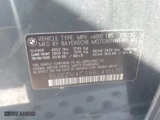 2011 BMW X5 35i with VIN 5UXZV4C58BL410570, listed as a IAAI auction lot 41886238 with 164,192 mi miles. Bid and sale history available at carsss.com. Image 9.