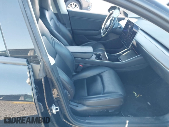 2018 Tesla Model 3 Long Range Battery with VIN 5YJ3E1EA5JF171948, listed as a IAAI auction lot 41993887 with 42,370 mi miles and . Bid and sale history available at DreamBid. Image 5.