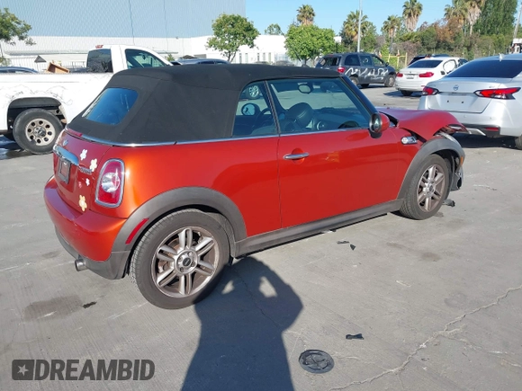2012 MINI Convertible with VIN WMWZN3C54CT134124, listed as a IAAI auction lot 42313148 with 119,963 mi miles and . Bid and sale history available at DreamBid. Image 4.