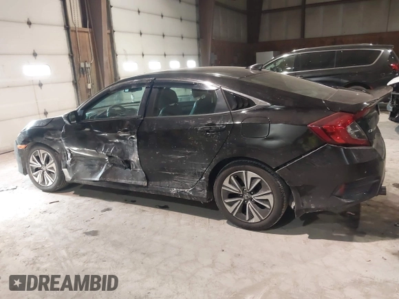2016 Honda Civic Sedan EX-L with VIN 19XFC1F75GE210803, listed as a IAAI auction lot 41424370 with 111,848 mi miles. Bid and sale history available at carsss.com. Image 14.