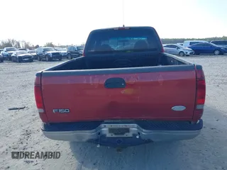 2000 Ford F-150 XL with VIN 1FTZX1729YNC32076, listed as a IAAI auction lot 41523364 with 216,726 mi miles. Bid and sale history available at carsss.com. Image 16.