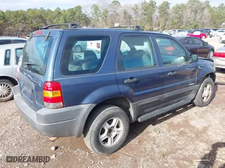 2001 Ford Escape XLT with VIN 1FMYU03181KC56156, listed as a IAAI auction lot 41231100 with 262,875 mi miles. Bid and sale history available at carsss.com. Image 4.