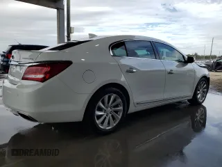 2015 Buick LaCrosse Leather with VIN 1G4GB5G36FF143638, listed as a Copart auction lot 89053335 with 136,728 mi miles and Salvage Title. Bid and sale history available at carsss.com. Image 3.