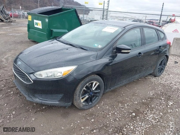 2015 Ford Focus SE with VIN 1FADP3K25FL209843, listed as a IAAI auction lot 41768161 with 144,830 mi miles. Bid and sale history available at carsss.com. Image 2.