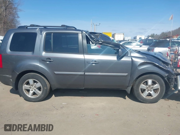 2012 Honda Pilot EX-L with VIN 5FNYF4H75CB045693, listed as a IAAI auction lot 41795689 with 200,686 mi miles and . Bid and sale history available at DreamBid. Image 13.