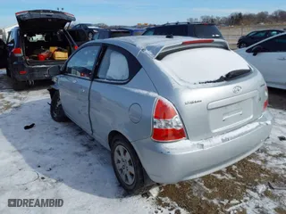 2011 Hyundai Accent GS with VIN KMHCM3AC4BU188511, listed as a IAAI auction lot 41598306 with 145,970 mi miles. Bid and sale history available at carsss.com. Image 3.