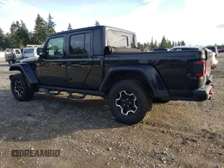 2021 Jeep Gladiator Rubicon with VIN 1C6JJTBG5ML500423, listed as a Copart auction lot 46954765 with 82,483 mi miles and Salvage title. Bid and sale history available at DreamBid. Image 2.