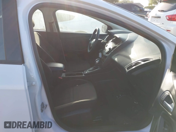 2018 Ford Focus SE z VIN 1FADP3F23JL328462, wystawiony jako IAAI lot #42068209 z przebiegiem 63 194 mil mil oraz . Historia ofert i sprzedaży dostępna na DreamBid. Obrazek 5.