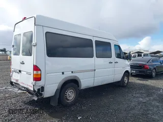 2005 Dodge Sprinter with VIN WD0PD644355798997, listed as a IAAI auction lot 41763328 with 227,692 mi miles and . Bid and sale history available at DreamBid. Image 4.