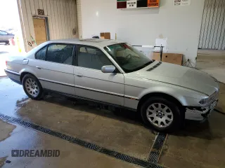 2000 BMW 7 Series 740iL with VIN WBAGH8341YDP13706, listed as a Copart auction lot 78727604 with 215,793 mi miles and Salvage Title. Bid and sale history available at carsss.com. Image 4.