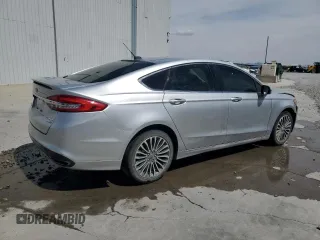 2018 Ford Fusion Titanium z VIN 3FA6P0D96JR155318, wystawiony jako Copart lot #53740505 z przebiegiem 86 567 mil mil oraz Szkoda całkowita • Salvage title. Historia ofert i sprzedaży dostępna na DreamBid. Obrazek 3.