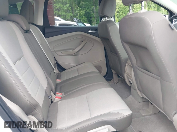 2014 Ford Escape SE with VIN 1FMCU9G90EUB76911, listed as a IAAI auction lot 42143518 with 123,466 mi miles and . Bid and sale history available at DreamBid. Image 8.