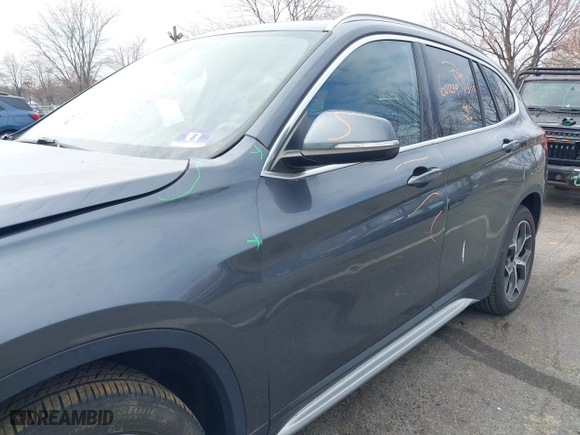 2019 BMW X1 xDrive28i with VIN WBXHT3C51K5L90571, listed as a IAAI auction lot 41909209 with 35,902 mi miles. Bid and sale history available at carsss.com. Image 20.