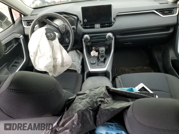2023 Toyota RAV4 Hybrid LE with VIN JTMMWRFV3PD570648, listed as a Copart auction lot 86983174 with 27,258 mi miles and Salvage title. Bid and sale history available at DreamBid. Image 8.