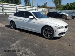 2018 BMW 3 Series 330i with VIN WBA8B9C58JEE80964, listed as a Copart auction lot 57103285 with 188,488 mi miles and Salvage title. Bid and sale history available at DreamBid. Image 4.