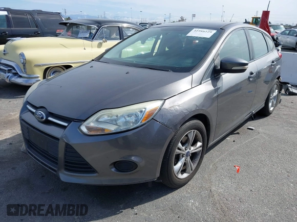 2013 Ford Focus SE with VIN 1FADP3K26DL245456, listed as a IAAI auction lot 41916229 with 164,737 mi miles and . Bid and sale history available at DreamBid. Image 2.