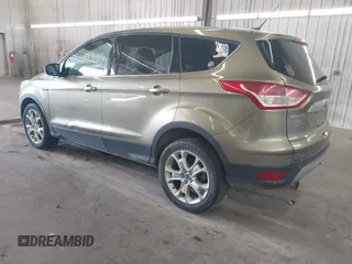 2013 Ford Escape SEL with VIN 1FMCU0HX0DUB83459, listed as a IAAI auction lot 41985453 with 198,182 mi miles and . Bid and sale history available at DreamBid. Image 3.