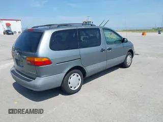 2000 Toyota Sienna LE with VIN 4T3ZF13C4YU211145, listed as a IAAI auction lot 42705612 with 217,825 mi miles and . Bid and sale history available at DreamBid. Image 4.