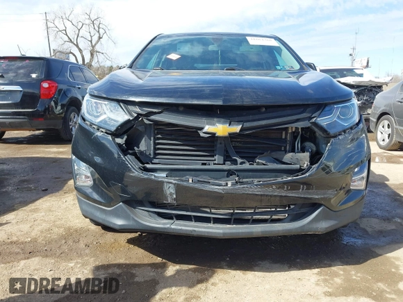 2019 Chevrolet Equinox LT z VIN 3GNAXUEV0KL216360, wystawiony jako IAAI lot #41664268 z przebiegiem 69 411 mil mil oraz . Historia ofert i sprzedaży dostępna na DreamBid. Obrazek 12.