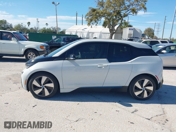 2017 BMW i3 z VIN WBY1Z8C55HV550906, wystawiony jako IAAI lot #41705056 z przebiegiem 79 566 mil mil oraz . Historia ofert i sprzedaży dostępna na DreamBid. Obrazek 14.