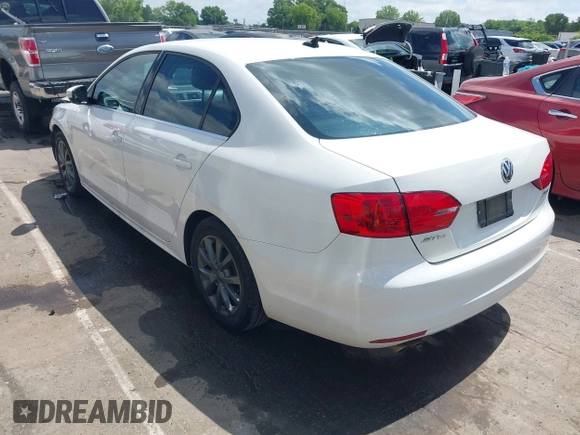 2013 Volkswagen Jetta SE with VIN 3VWDX7AJ1DM319114, listed as a IAAI auction lot 42295095 with 164,583 mi miles and . Bid and sale history available at DreamBid. Image 3.