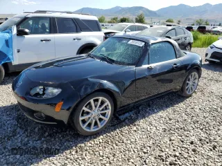 2006 Mazda MX-5 Miata Grand Touring z VIN JM1NC25FX60103537, wystawiony jako Copart lot #59038125 z przebiegiem 32 598 mil mil oraz Szkoda całkowita • Salvage title. Historia ofert i sprzedaży dostępna na DreamBid. Obrazek 1.