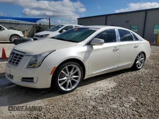 2013 Cadillac XTS Premium z VIN 2G61S5S32D9153013, wystawiony jako Copart lot #80877424 z przebiegiem Nie podano mil oraz Nie do naprawy. Historia ofert i sprzedaży dostępna na DreamBid. Obrazek 1.