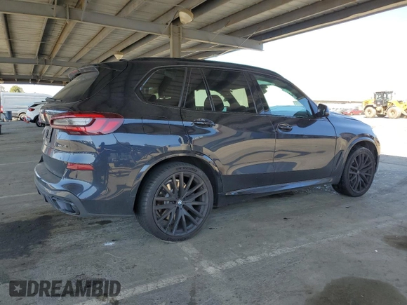 2020 BMW X5 xDrive40i with VIN 5UXCR6C02L9C72472, listed as a Copart auction lot 48023145 with 59,200 mi miles and Salvage title. Bid and sale history available at DreamBid. Image 3.