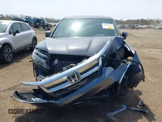 2019 Honda Pilot EX-L with VIN 5FNYF6H55KB082929, listed as a IAAI auction lot 42057611 with 93,532 mi miles and . Bid and sale history available at DreamBid. Image 12.