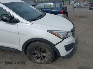2014 Hyundai Santa Fe z VIN 5XYZTDLB1EG197765, wystawiony jako IAAI lot #41999374 z przebiegiem 172 430 mil mil oraz . Historia ofert i sprzedaży dostępna na DreamBid. Obrazek 18.