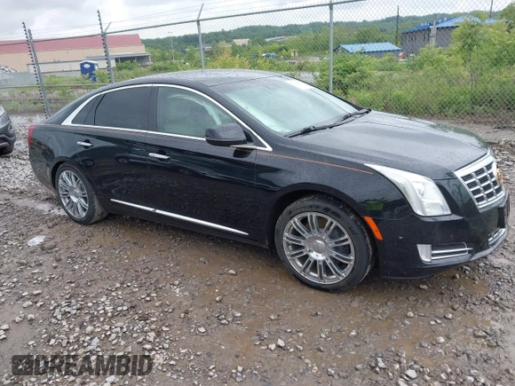2014 Cadillac XTS Luxury with VIN 2G61M5S32E9231544, listed as a IAAI auction lot 42340088 with 74,518 mi miles and . Bid and sale history available at DreamBid. Image 1.