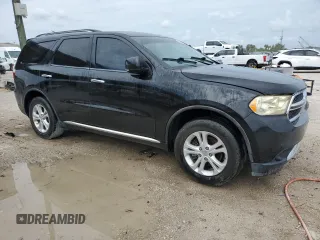 2013 Dodge Durango Crew with VIN 1C4RDHDG6DC657438, listed as a Copart auction lot 62883675 with 129,500 mi miles and Clean title. Bid and sale history available at DreamBid. Image 4.
