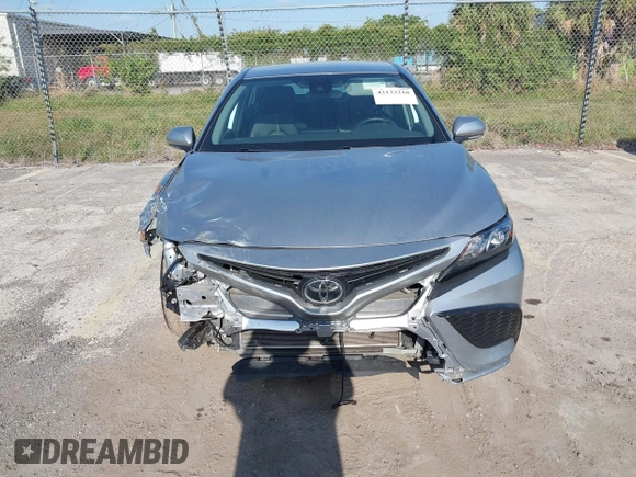 2023 Toyota Camry SE with VIN 4T1G11AK5PU750719, listed as a IAAI auction lot 42133210 with 55,688 mi miles. Bid and sale history available at carsss.com. Image 12.