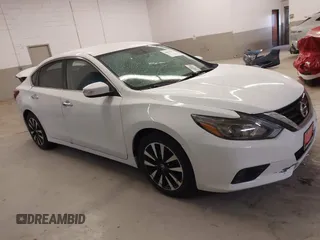 2018 Nissan Altima SR z VIN 1N4AL3AP1JC181544, wystawiony jako IAAI lot #40940704 z przebiegiem 68 731 mil mil oraz . Historia ofert i sprzedaży dostępna na DreamBid. Obrazek 14.