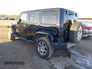 2014 Jeep Wrangler Unlimited Sahara with VIN 1C4BJWEG7EL322316, listed as a IAAI auction lot 41059508 with 144,662 mi miles. Bid and sale history available at carsss.com. Image 3.