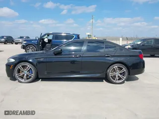 2013 BMW M5 with VIN WBSFV9C54DD095547, listed as a IAAI auction lot 41601733 with 1 mi miles. Bid and sale history available at carsss.com. Image 14.