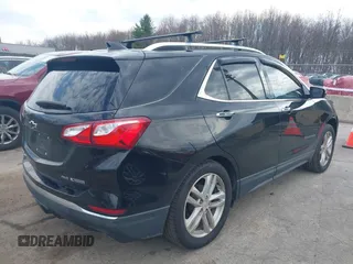 2018 Chevrolet Equinox Premier with VIN 2GNAXWEX6J6302935, listed as a IAAI auction lot 42065883 with 61,983 mi miles and . Bid and sale history available at carsss.com. Image 4.