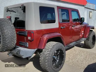 2010 Jeep Wrangler Unlimited Sahara with VIN 1J4BA5H10AL117474, listed as a Copart auction lot 51196435 with 131,256 mi miles and Clean Title. Bid and sale history available at carsss.com. Image 4.
