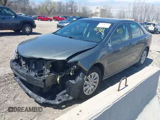 2012 Toyota Camry L z VIN 4T4BF1FK9CR229751, wystawiony jako IAAI lot #42190311 z przebiegiem 105 955 mil mil oraz . Historia ofert i sprzedaży dostępna na DreamBid. Obrazek 2.